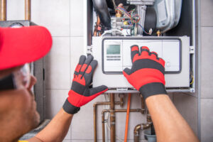 A professional technician installing a new Furnace system